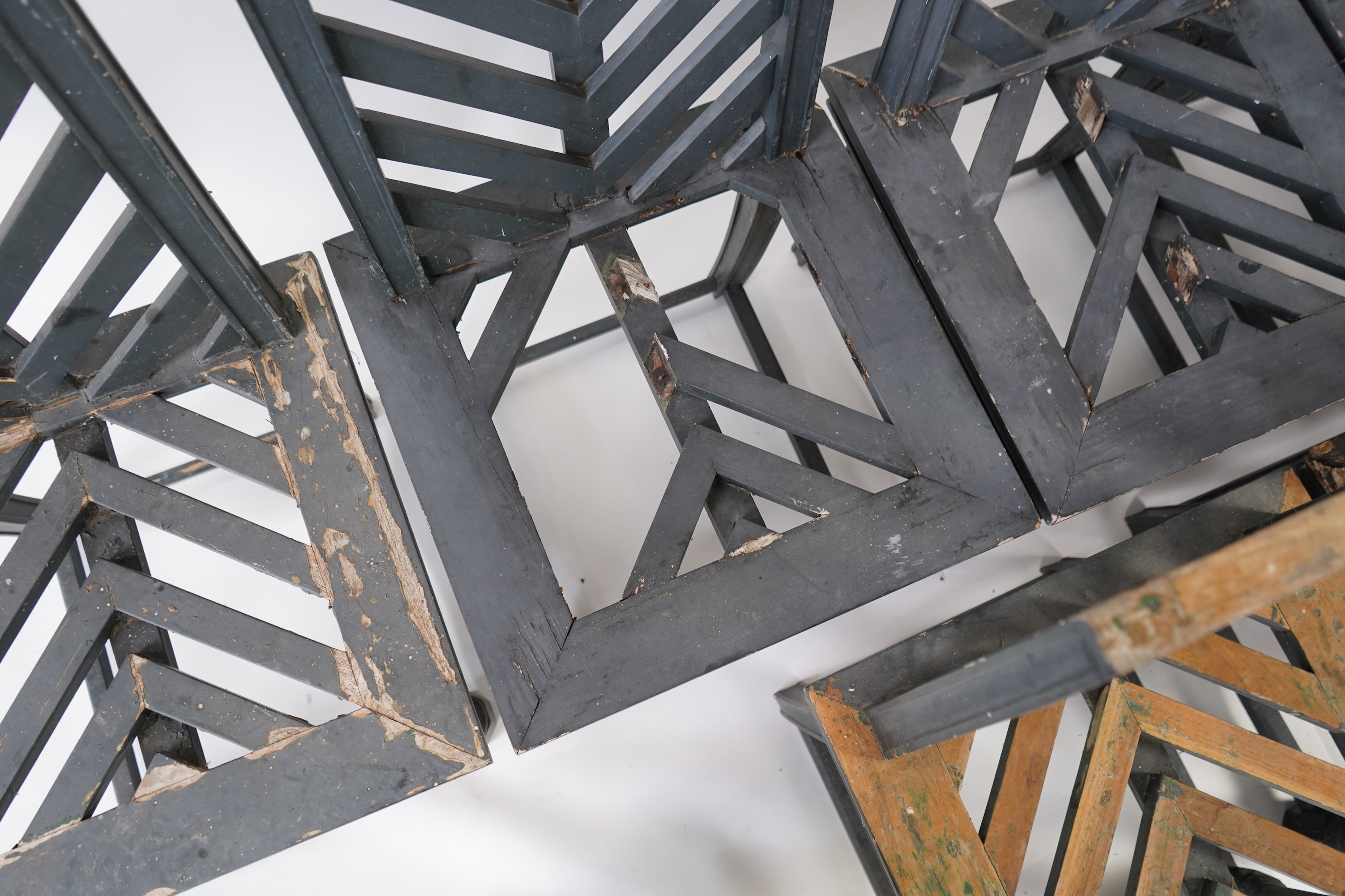 A set of fourteen green painted beech garden chairs, designed by Emilio Terry for the Theatre de Verdue, Chateau De Groussay